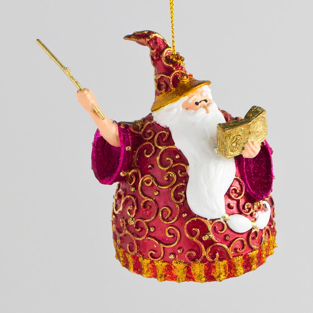 Weihnachtsmann mit Zauberstab und Buch